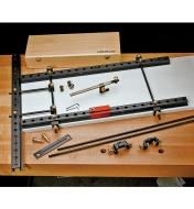 Deluxe System components displayed on a workbench, with rails clamped onto a panel