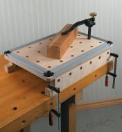 Medium Risers installed on a Veritas Worksurface and clamped to a workbench