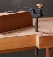 Veritas Hold-Down clamping a wood block on a workbench