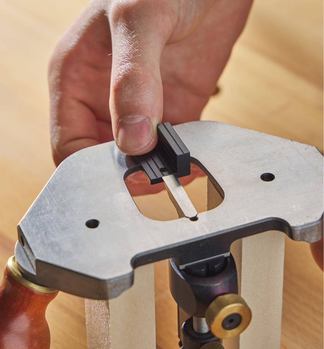 Using a layout block to set the blade of a router plane
