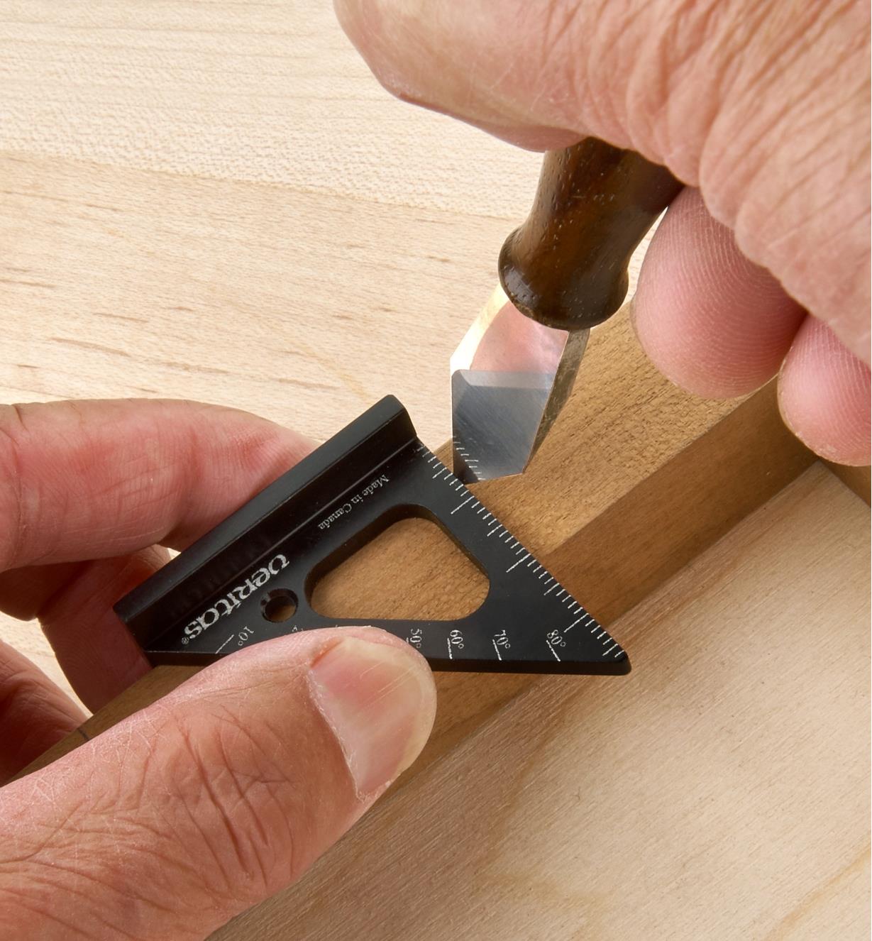 Using a 35mm Pocket Layout Square and a striking knife to mark out a hinge gain on a workpiece